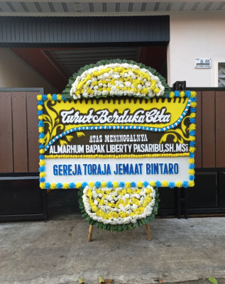 Papan Bunga Duka di Bugi
